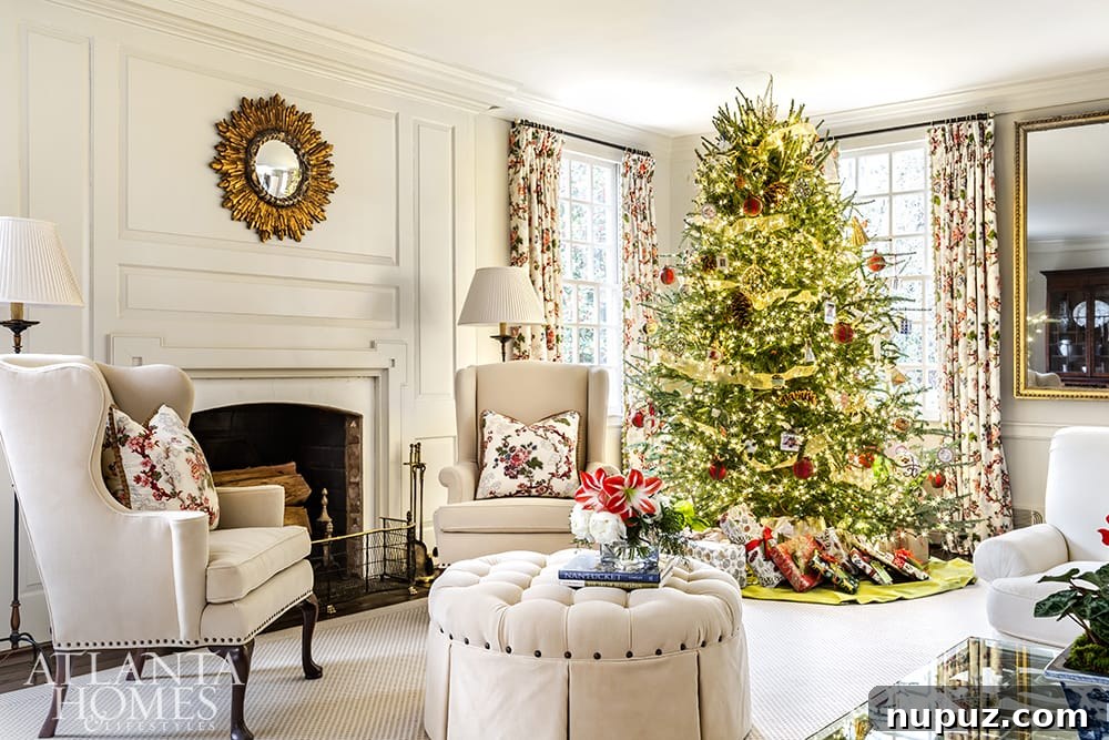 A charming Christmas tree with cozy, rustic accents in a home designed by Beth Ervin Interiors and Norman Davenport Askins, Architect.