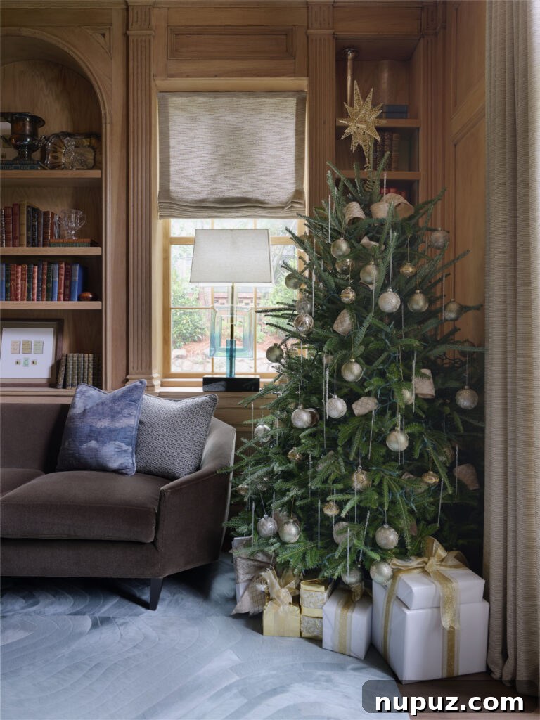Luxurious Christmas tree decor by Tish Mills Interiors, demonstrating sophisticated ornament layering and warm lighting.