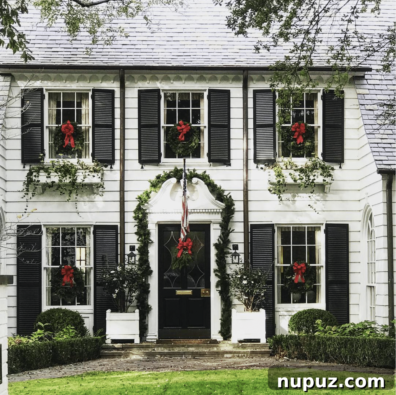Festive Christmas decor with beautifully wrapped gifts and greenery, embodying the spirit of holiday traditions.