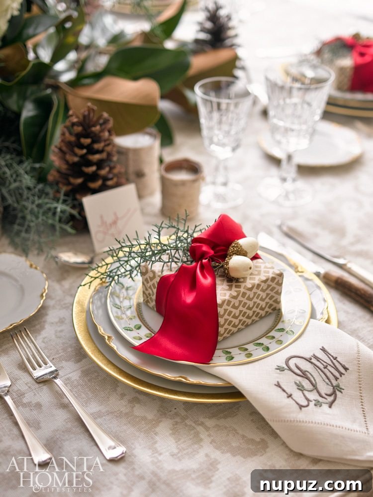 A lavish Christmas dining table adorned with exquisite fine china, crystal glasses, and elegant silver cutlery, set for a festive holiday meal.