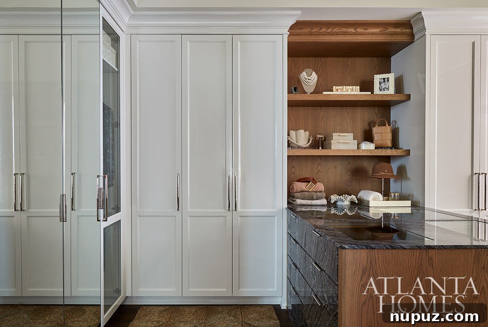 Spacious, organized walk-in closet with custom shelving and drawers for a tailored wardrobe