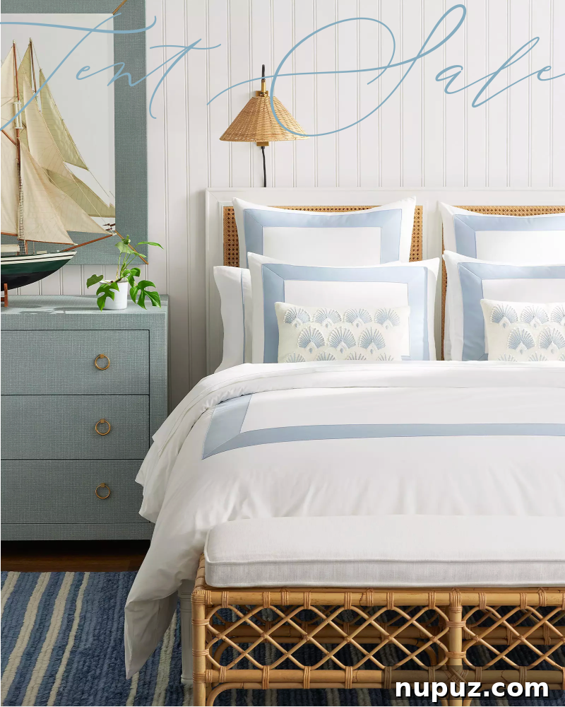 A Farmhouse Sanctuary of Enduring Style 4 Coastal-inspired bedroom bedding by Serena and Lily creating a serene and charming farmhouse sanctuary.