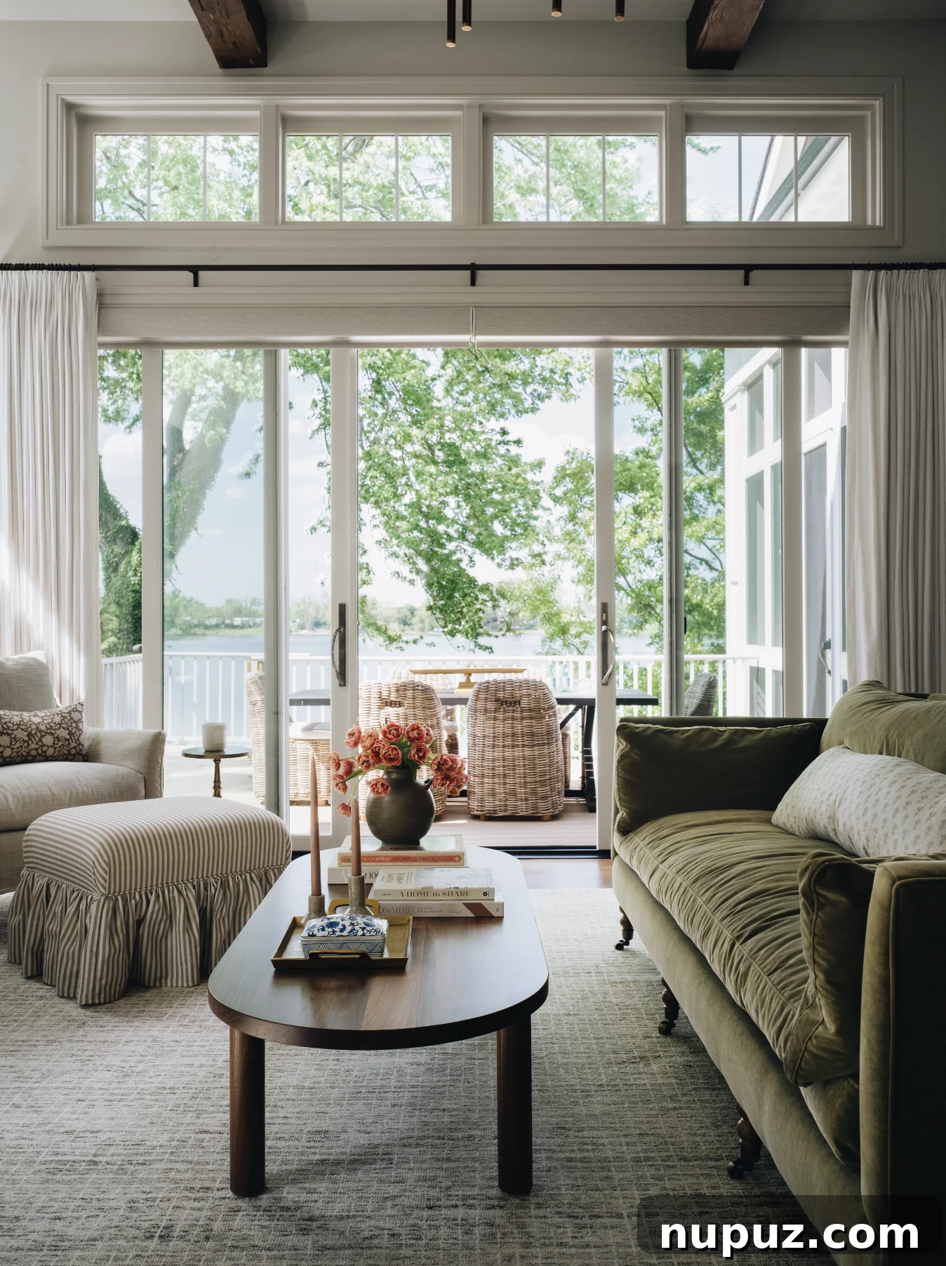 Cultivating Comfort: 15 Cozy Home Decor Ideas 2 Jean Stoffer Design creates homes with that certain undefinable something, with cozy home decor that makes a house feel like home. Stoffer Photography Interiors - living room with green velvet sofa