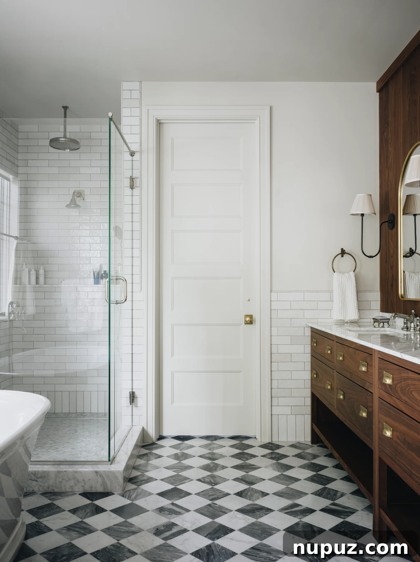 Cultivating Comfort: 15 Cozy Home Decor Ideas 13 Jean Stoffer Design creates homes with that certain undefinable something. Stoffer Photography Interiors - love the stained cabinets and black and white marble floor in the primary bathroom