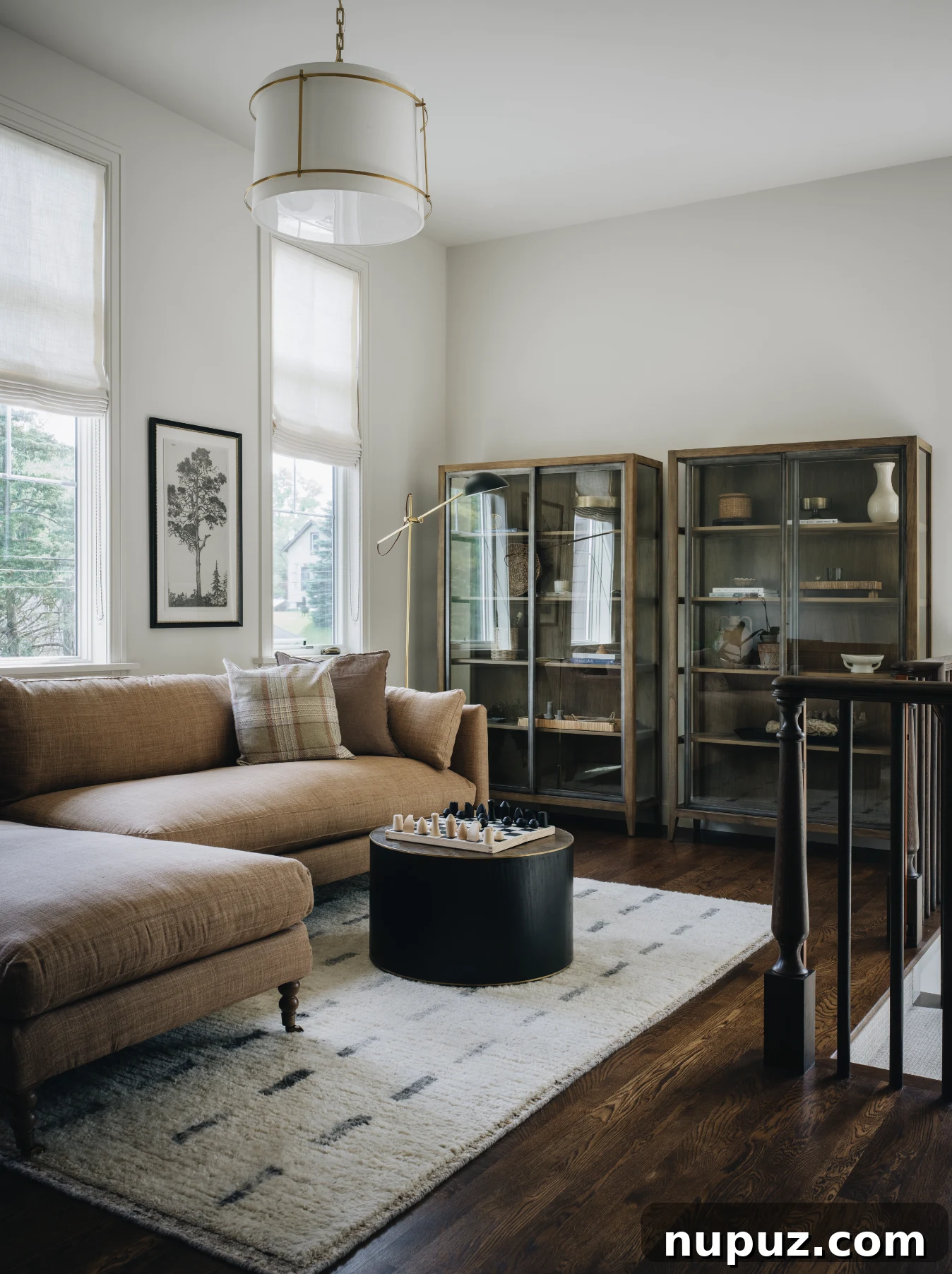 Cultivating Comfort: 15 Cozy Home Decor Ideas 3 Jean Stoffer Design creates homes with that certain undefinable something, with cozy home decor that makes a house feel like home. Stoffer Photography Interiors - living room with tan sectional sofa
