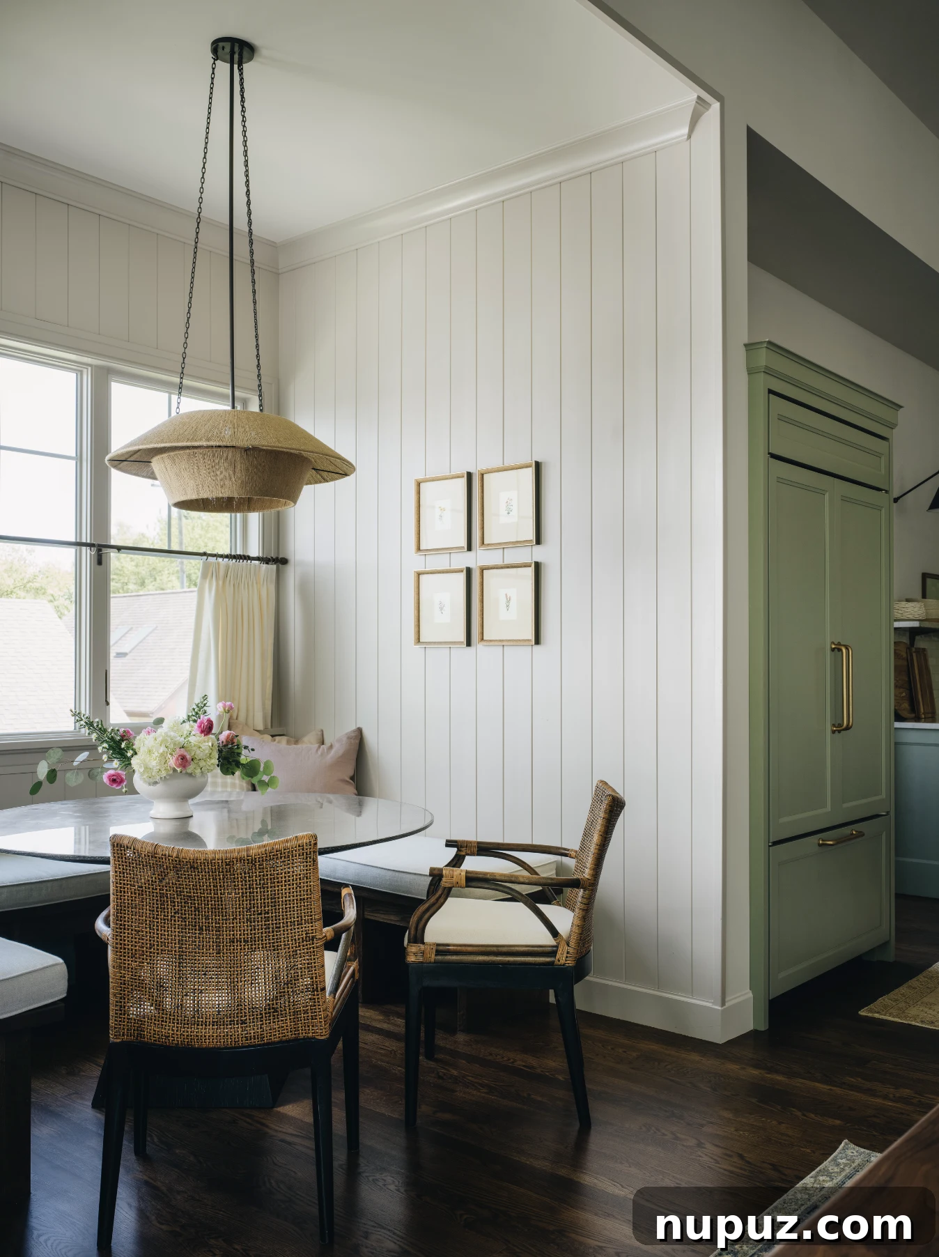 Cultivating Comfort: 15 Cozy Home Decor Ideas 6 Jean Stoffer Design creates homes with that certain undefinable something, with cozy home decor that makes a house feel like home. Stoffer Photography Interiors - love the dining nook with the banquette and round dining table