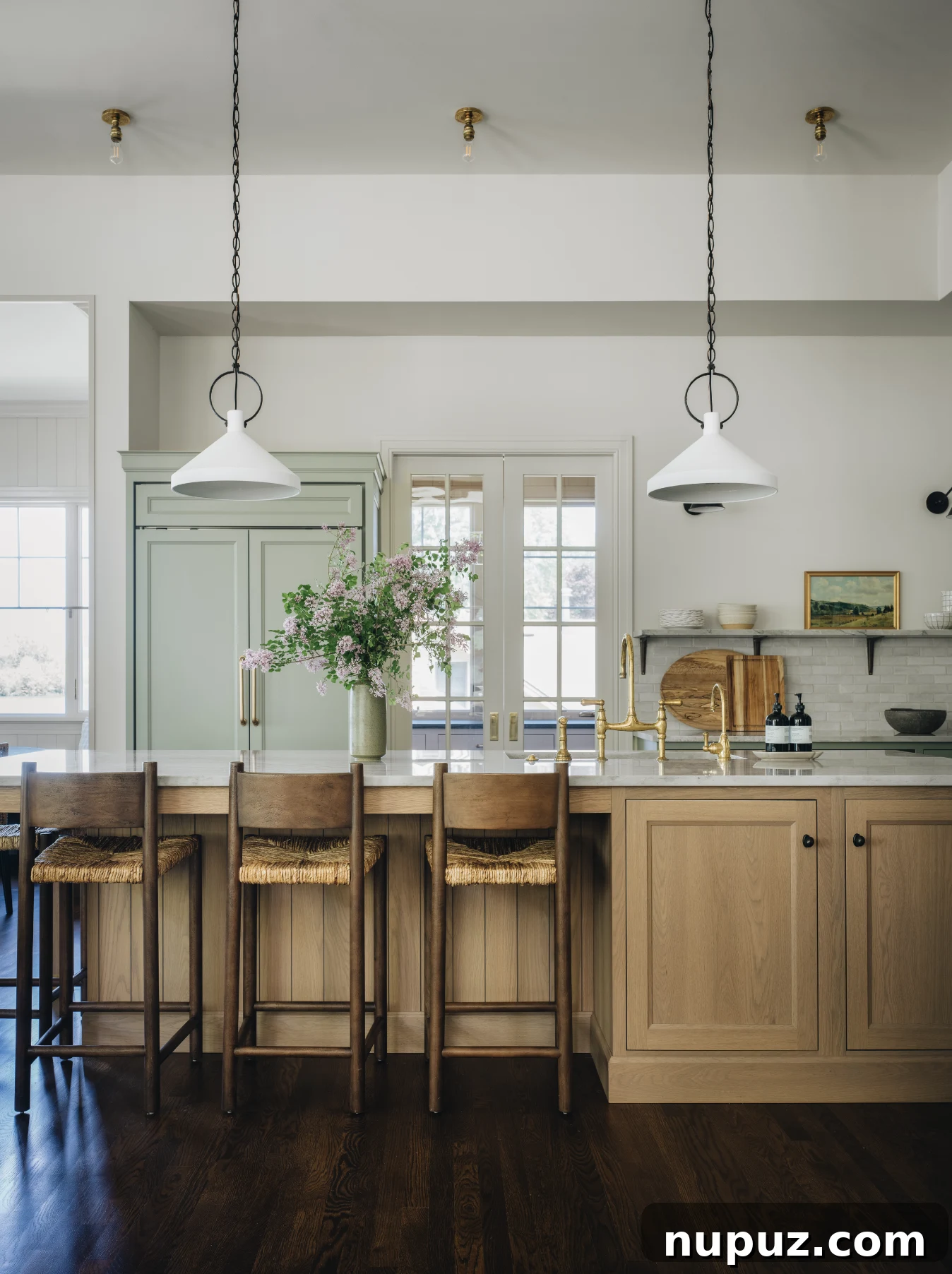 Cultivating Comfort: 15 Cozy Home Decor Ideas 7 Jean Stoffer Design creates homes with that certain undefinable something, with cozy home decor that makes a house feel like home. Stoffer Photography Interiors - love the kitchen with the green refrigerator