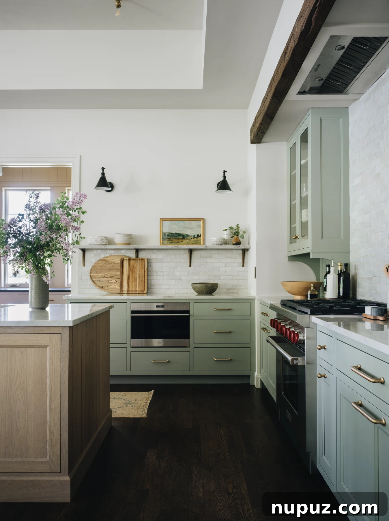 Cultivating Comfort: 15 Cozy Home Decor Ideas 8 Jean Stoffer Design creates homes with that certain undefinable something, with cozy home decor that makes a house feel like home. Stoffer Photography Interiors - love the green kitchen