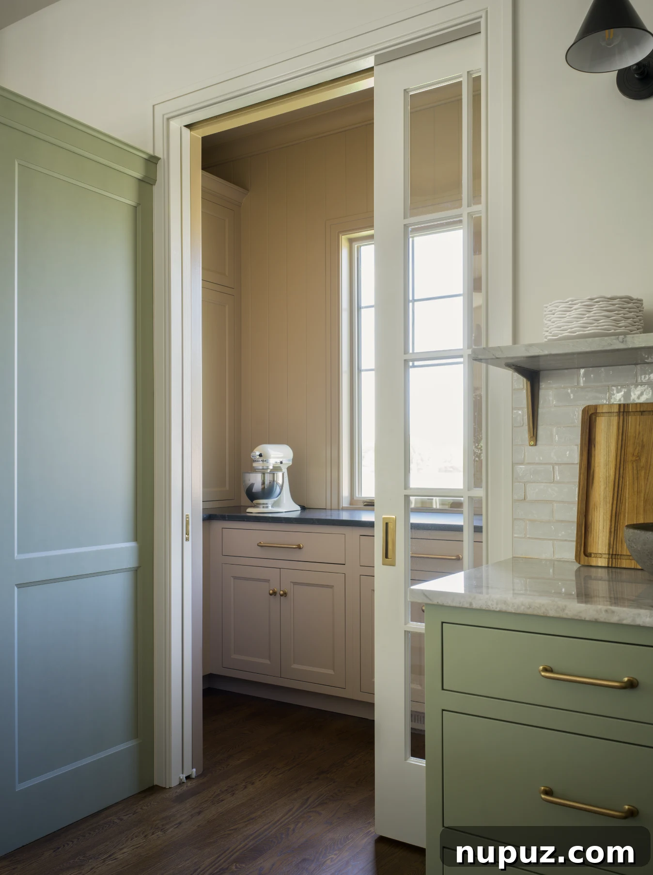 Cultivating Comfort: 15 Cozy Home Decor Ideas 9 Jean Stoffer Design creates homes with that certain undefinable something. Stoffer Photography Interiors - love the soft green kitchen