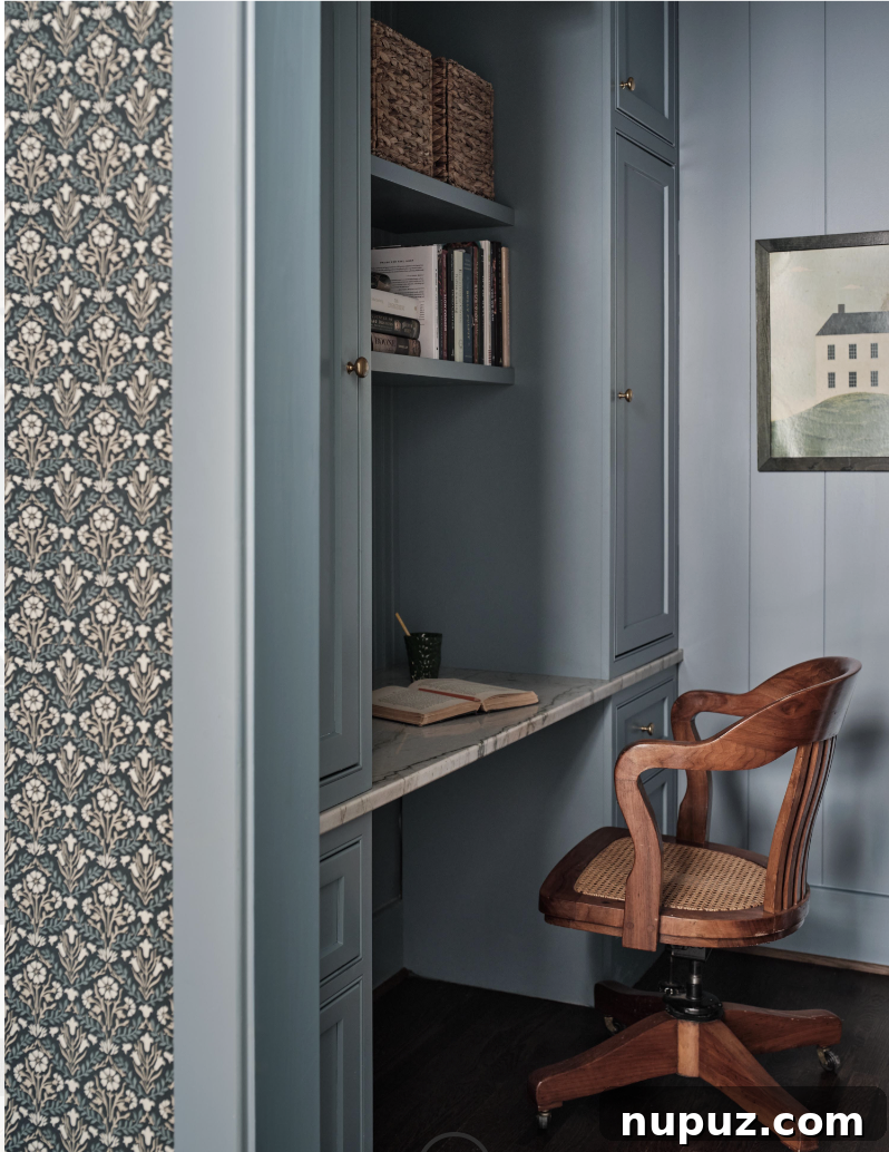 A perfectly designed nook for organizing your day and managing bills, a thoughtful space created by Sabbe Interior Design and photographed by Joseph Bradshaw, showcasing functional and purposeful room design.