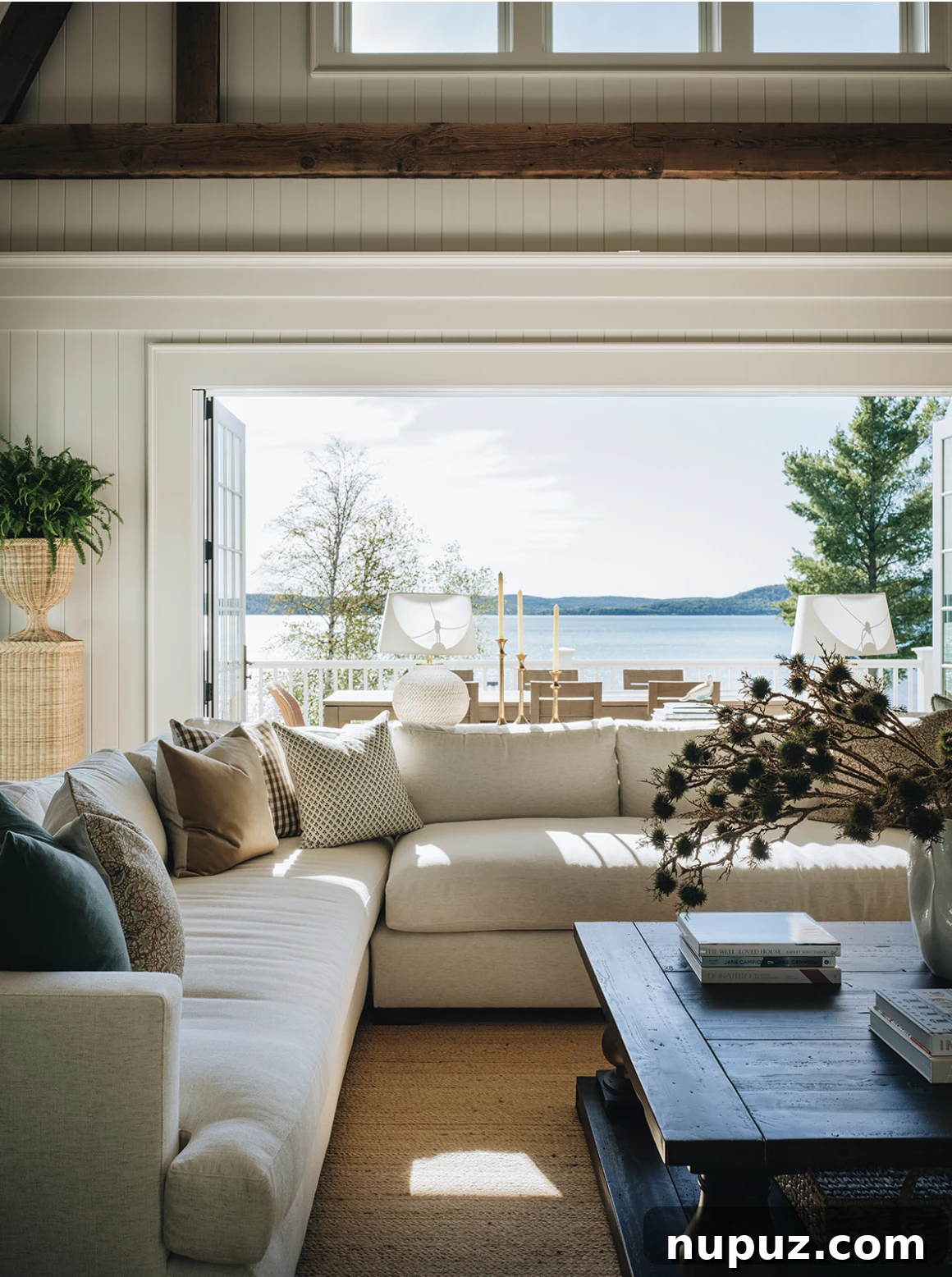 Nature has an unmatched way of soothing. Add large leafy branches in a vase or a potted olive tree in a corner - even a simple bowl of oranges. Natural light is equally important so keep window treatments light and airy and including a larger mirror across from windows to reflect the outdoor space. Bringing the outdoors instantly relaxes any room. Jean Stoffer Interior Design | Stoffer Photography Interior