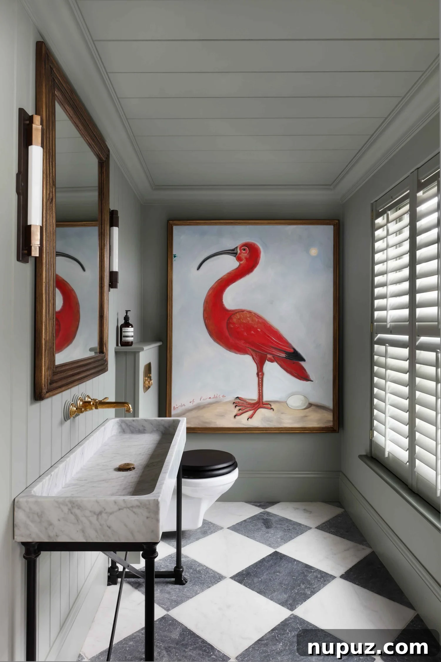 10 Steps to Your At-Home Spa Oasis 3 Elegant bathroom with unique spoonbill artwork, black and white marble floors, and sophisticated brass details, designed by Hám Interiors and captured by Alexander James Photography.