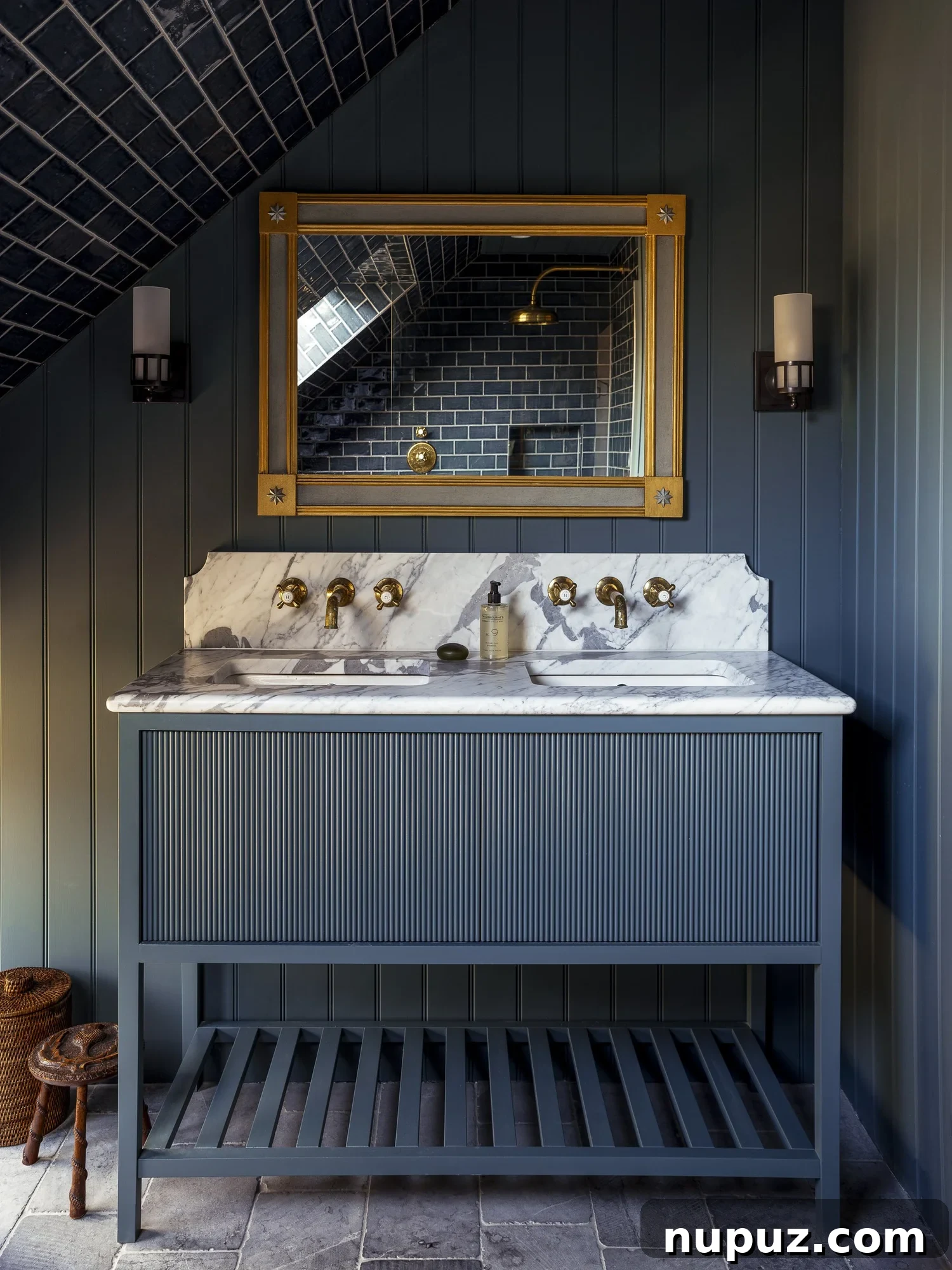 10 Steps to Your At-Home Spa Oasis 7 Exquisite blue marble sink paired with elegant brass hardware, demonstrating luxury and refined taste in a Hám Interiors bathroom design, captured by Alexander James Photography.