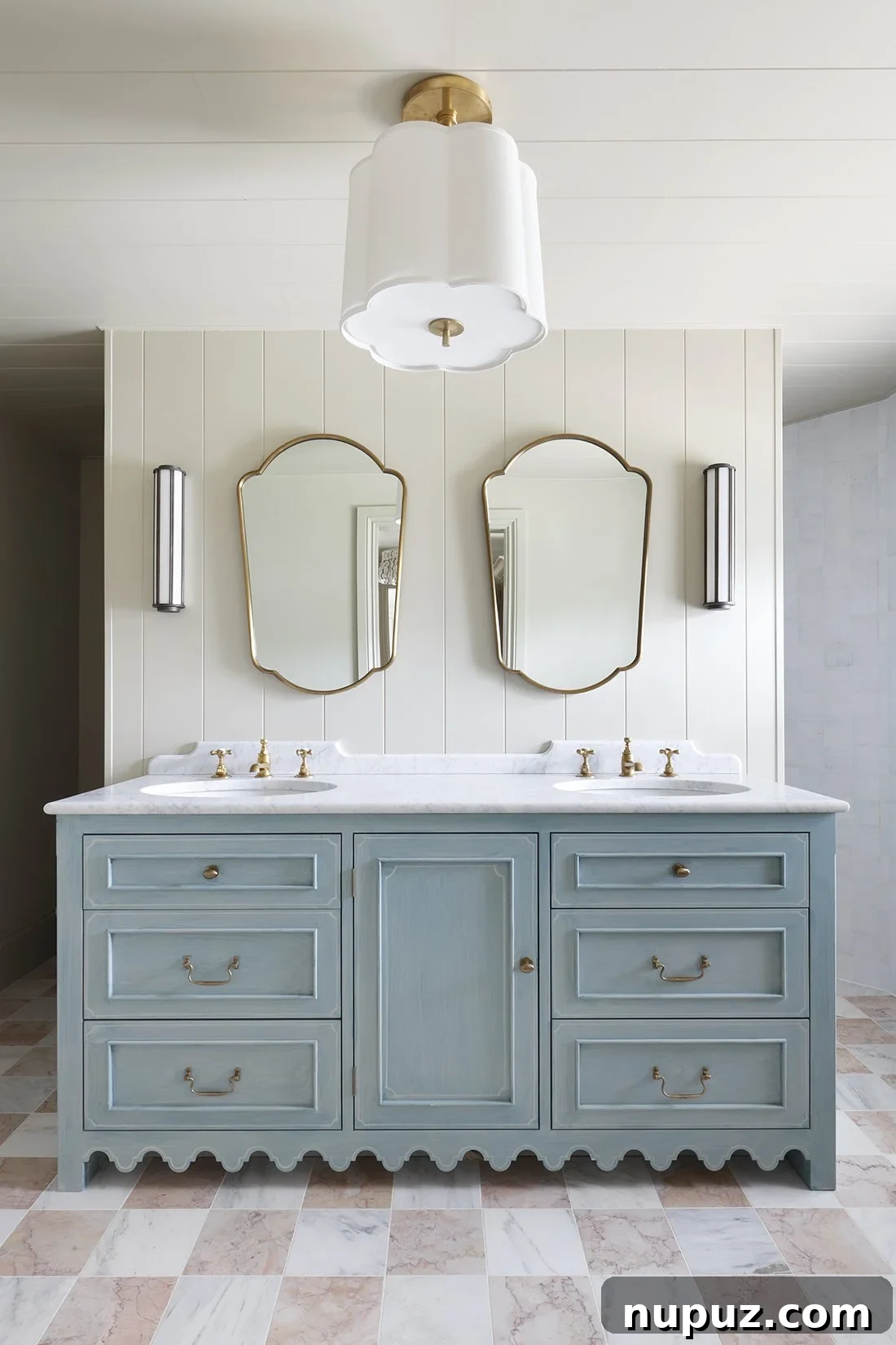10 Steps to Your At-Home Spa Oasis 8 Double sink vanity adorned with chic brass hardware, offering both functionality and a touch of luxury in a spa-like bathroom by Hám Interiors, captured by Alexander James Photography.