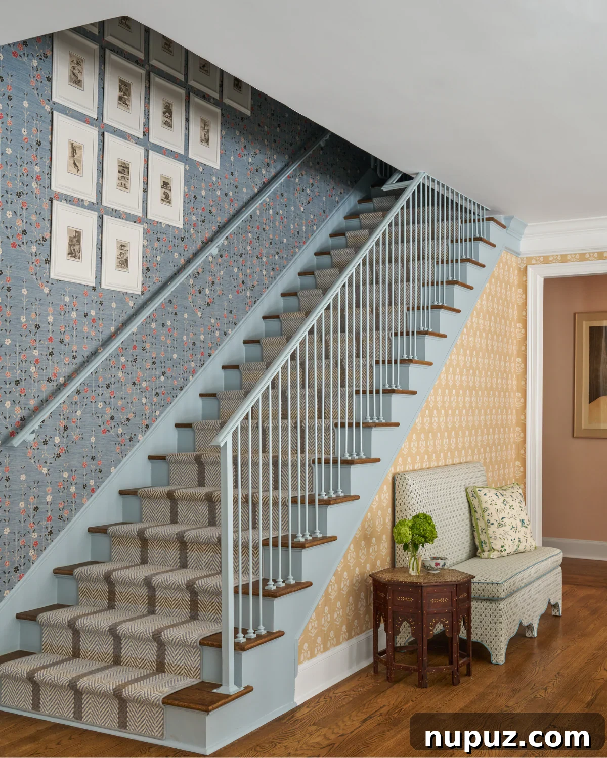 Crafting Your Sanctuary: Inspiring Home Interior Designs 2 Elegant foyer featuring blue and neutral tones with a curated gallery wall, designed by Dunbar Road Design