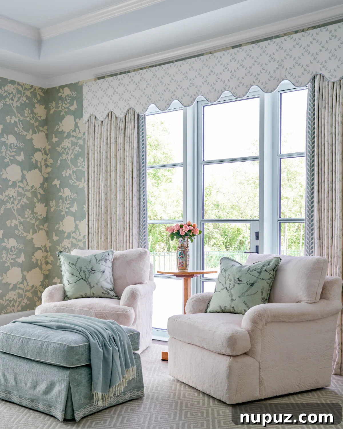 Crafting Your Sanctuary: Inspiring Home Interior Designs 12 Comfortable blue and white sitting area within a bedroom suite, offering a tranquil space for relaxation