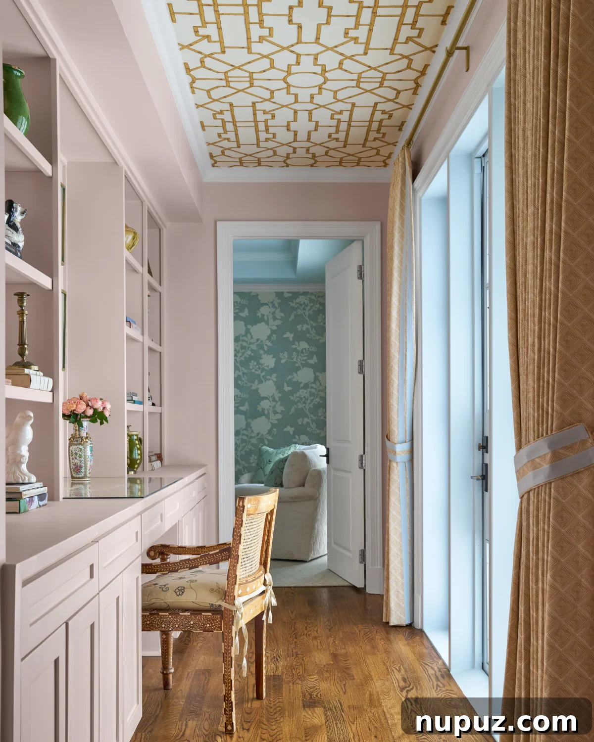 Crafting Your Sanctuary: Inspiring Home Interior Designs 10 Close-up of a stylish bedroom corner, highlighting the interplay of pink furnishings and a unique ceiling wallpaper for a cohesive look