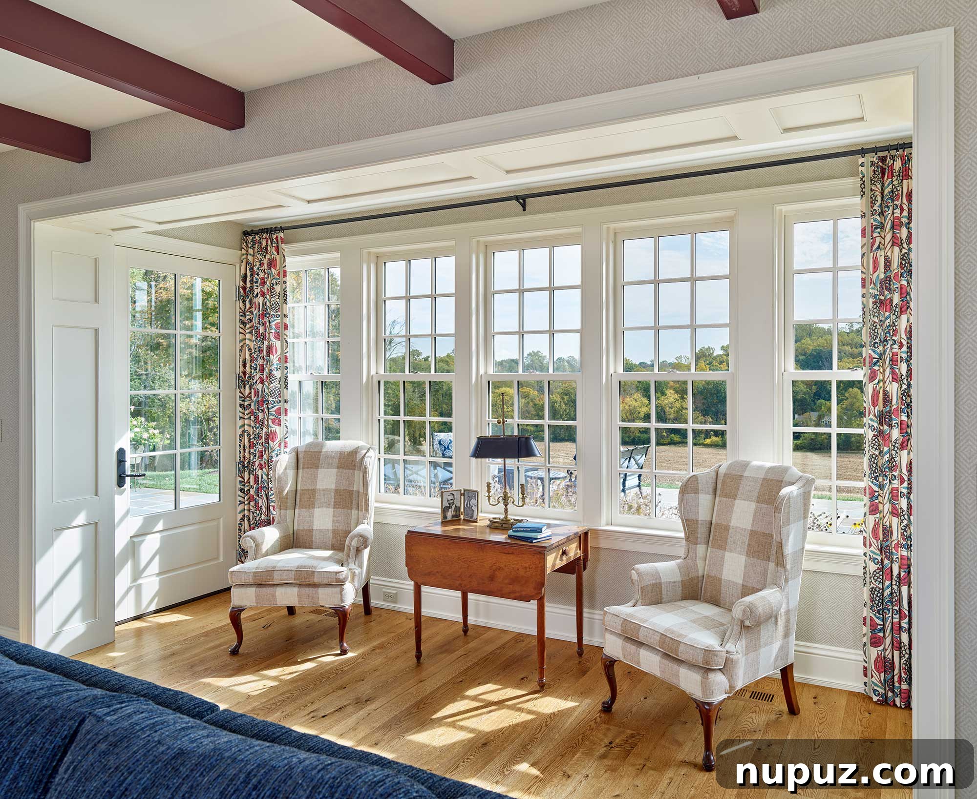 Grand entrance to a stone farmhouse with elegant architectural details, welcoming visitors to a timeless abode
