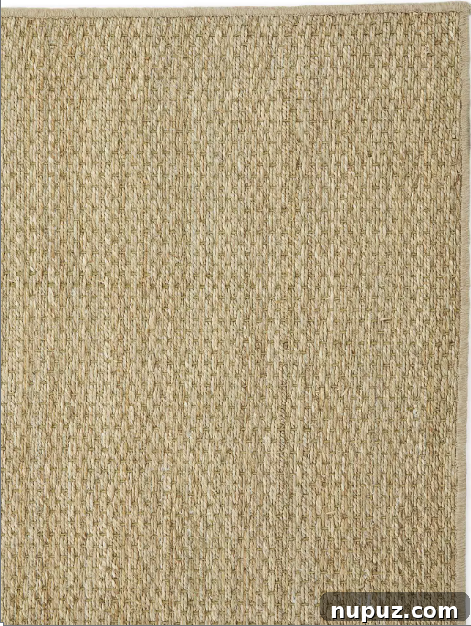 Spring Awakening: 5 Simple Decor Ideas for an Instant Home Transformation 6 A bright and airy room featuring a natural fiber seagrass rug, perfectly illustrating how swapping out dark rugs for lighter ones can freshen a home.