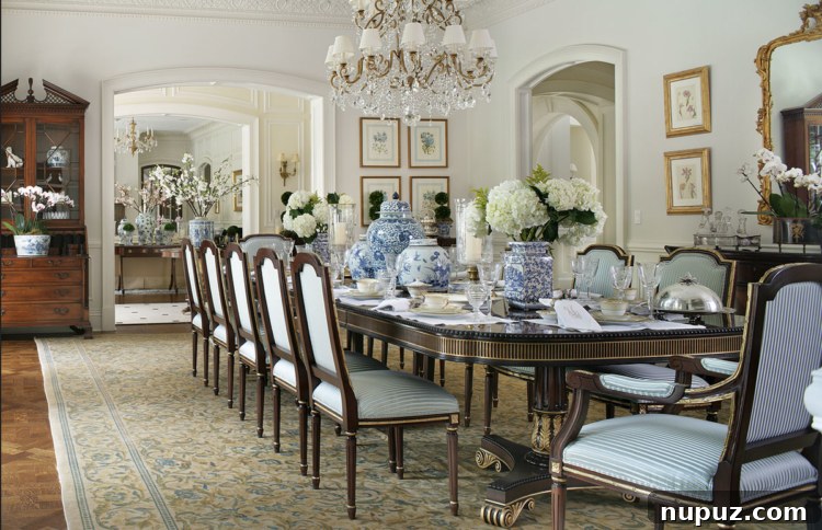 The Enchanted Home's Blue and White Spell 10 Inviting blue and white dining room with elegant place settings