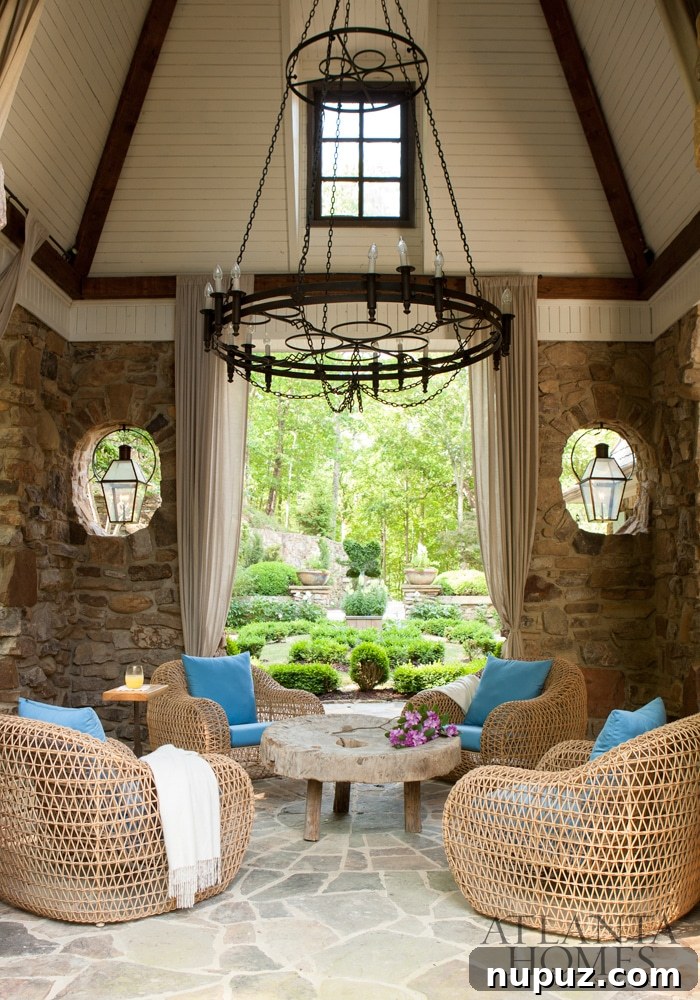 Atlanta Homes & Lifestyles | INTERIOR DESIGN Meridy King, Meridy King Interiors.| LANDSCAPE ARCHITECTURE Adriana Hernandez, Arcoiris Design Gardening | ARCHITECT Bill Edwards, Adriana Hernandez, Arcoiris Design Gardening | ARCHITECT Bill Edwards, Edwards Architecture Ltd. | Photography: Erica George Dines porch -Upscale Charm in this Fabulous Atlanta Home