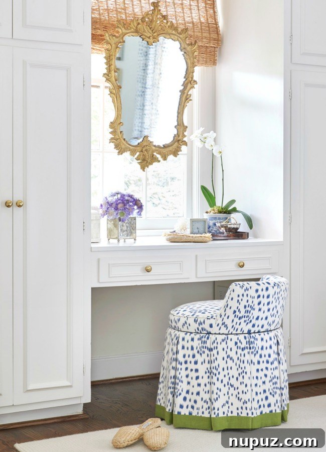 A charming and functional vanity space designed by Sarah Bartholomew, perfect for a lady's morning routine.