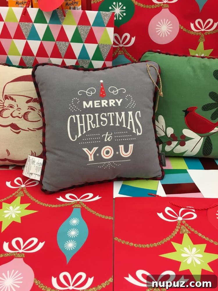 Hallmark Magic: Bringing the Holidays Home 9 An overhead shot displaying a variety of Inspirations from Hallmark gift bags, ribbons, and decorative elements, highlighting their cohesive designs.