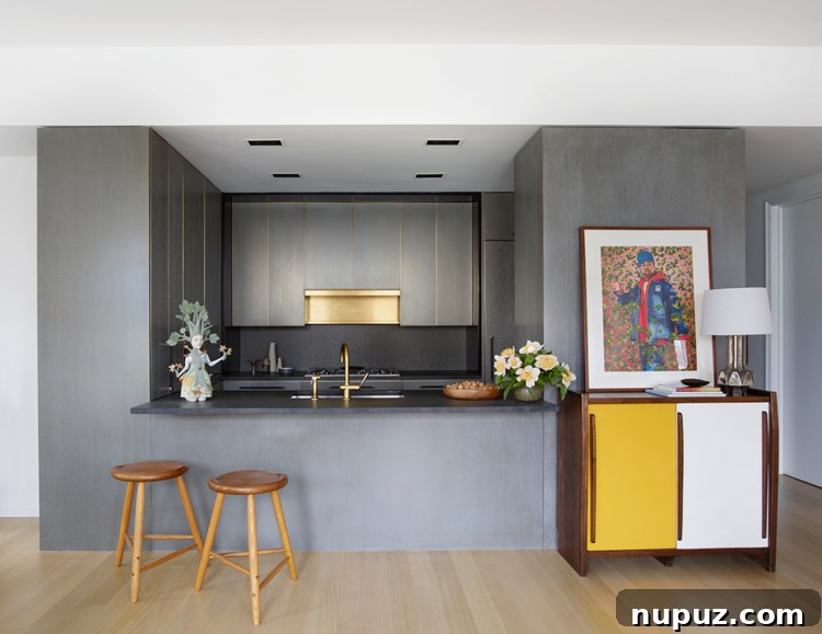 Timothy Brown Studio: Elevated Aesthetics 5 Lively dining area featuring a modern table, unique chairs, and a gallery wall with diverse artworks
