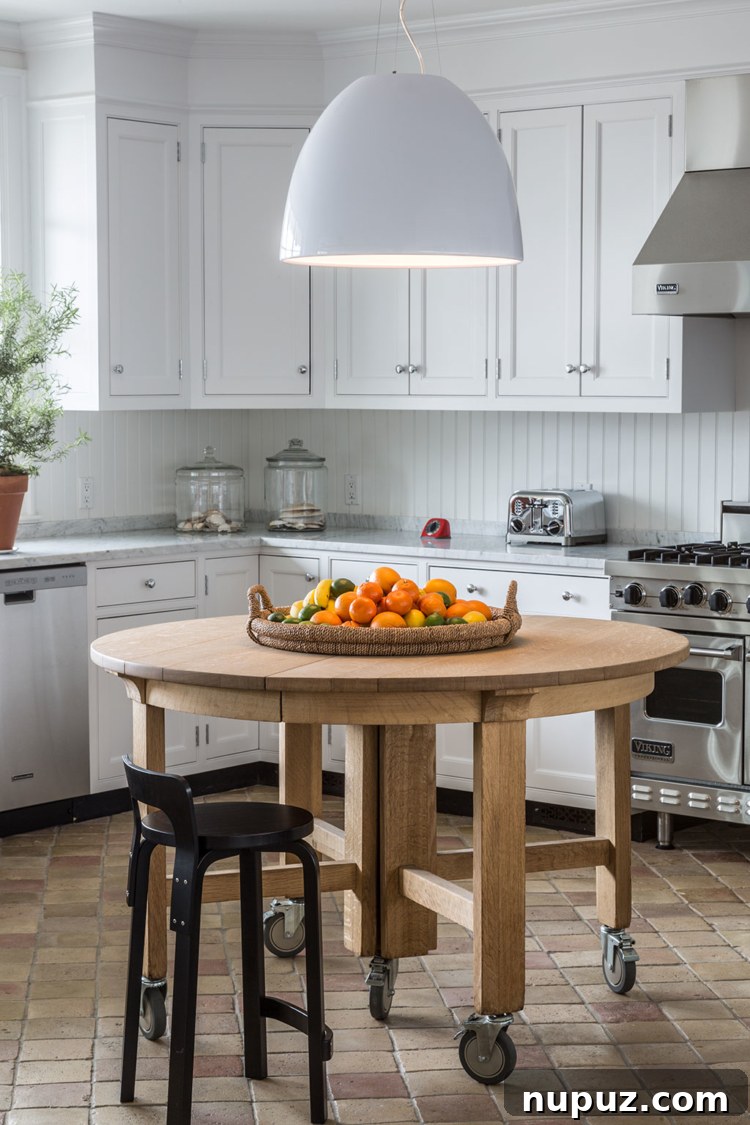 Timothy Brown Studio: Elevated Aesthetics 8 Chic kitchen with mixed metals, woven textures, and contemporary design elements