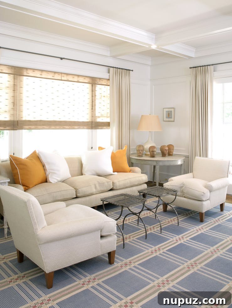 Elegant living area showcasing Brian Brady Design's chic yet comfortable style, featuring a fireplace and classic decor.