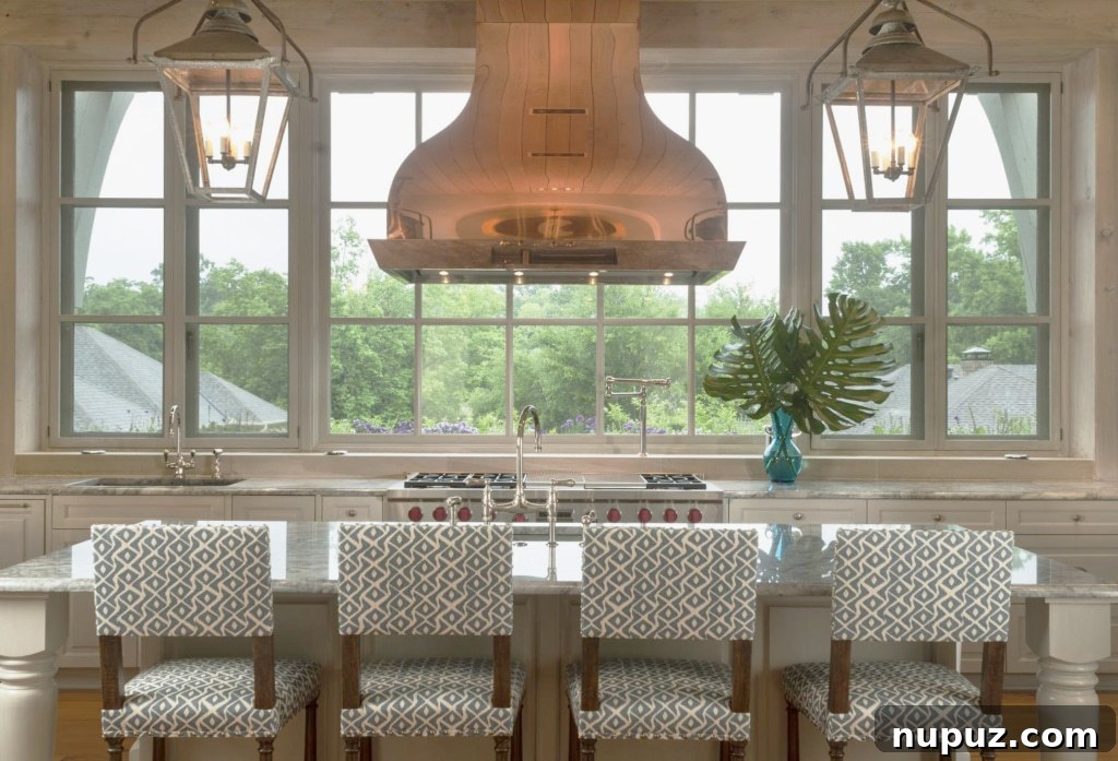 Jenkins Interiors kitchen with signature colored cabinets