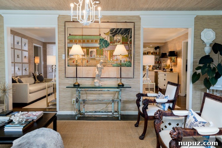 Step Inside Greensboro's Charming Oasis 3 Elegant living room interior showcasing sophisticated designer furniture and tasteful decor from Sourcc Design.