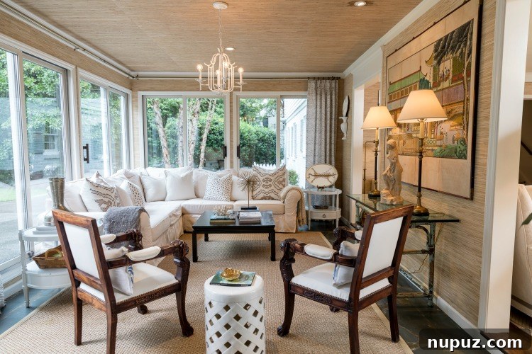 Step Inside Greensboro's Charming Oasis 4 Luxurious bedroom or seating area with plush furnishings and artistic elements, reflecting high-quality interior design.