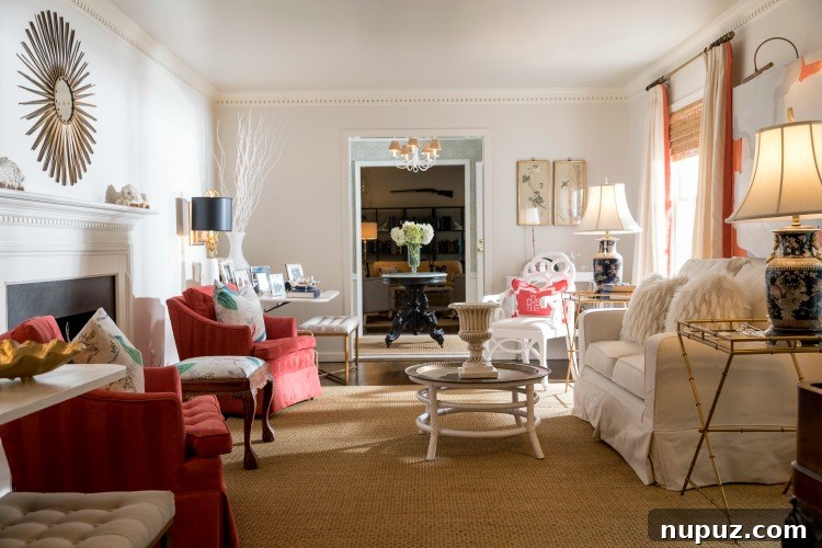 Step Inside Greensboro's Charming Oasis 8 Bright and airy interior space, possibly a sunroom or a transitional area, with stylish furniture and abundant natural light.