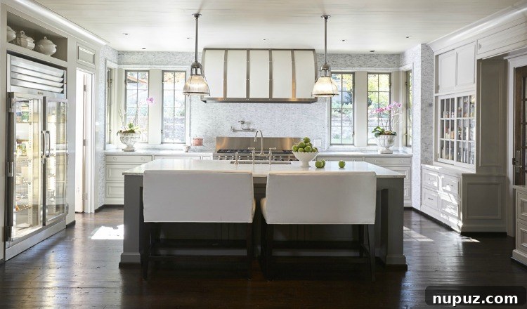 Custom built-in shelving unit with decorative elements in a refined room by Jeffrey Dungan