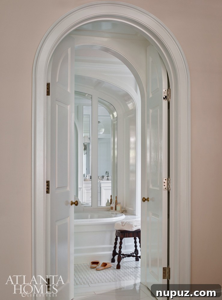 Luxurious master bathroom with a freestanding tub and elegant fixtures