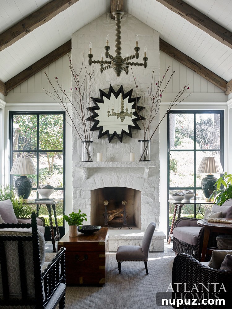 Elegant living room with a fireplace, comfortable seating, and soft lighting