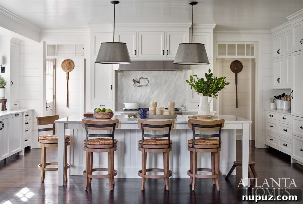 Modern white kitchen with wooden accents and ample natural light