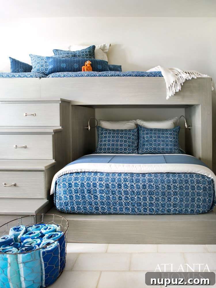 Costa Rica Dream Home Unveiled 11 Charming bunk room with blue and white decor in a Costa Rican beach house, offering ample sleeping quarters for guests.