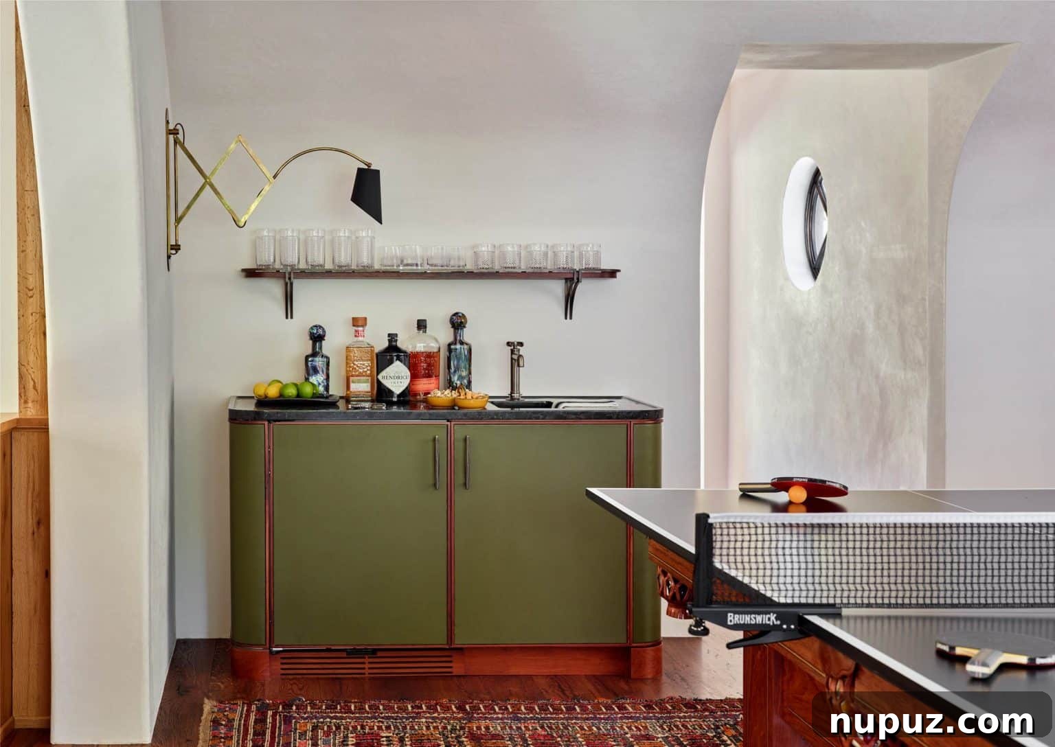 Well-appointed office or study space with custom shelving and classic furnishings.