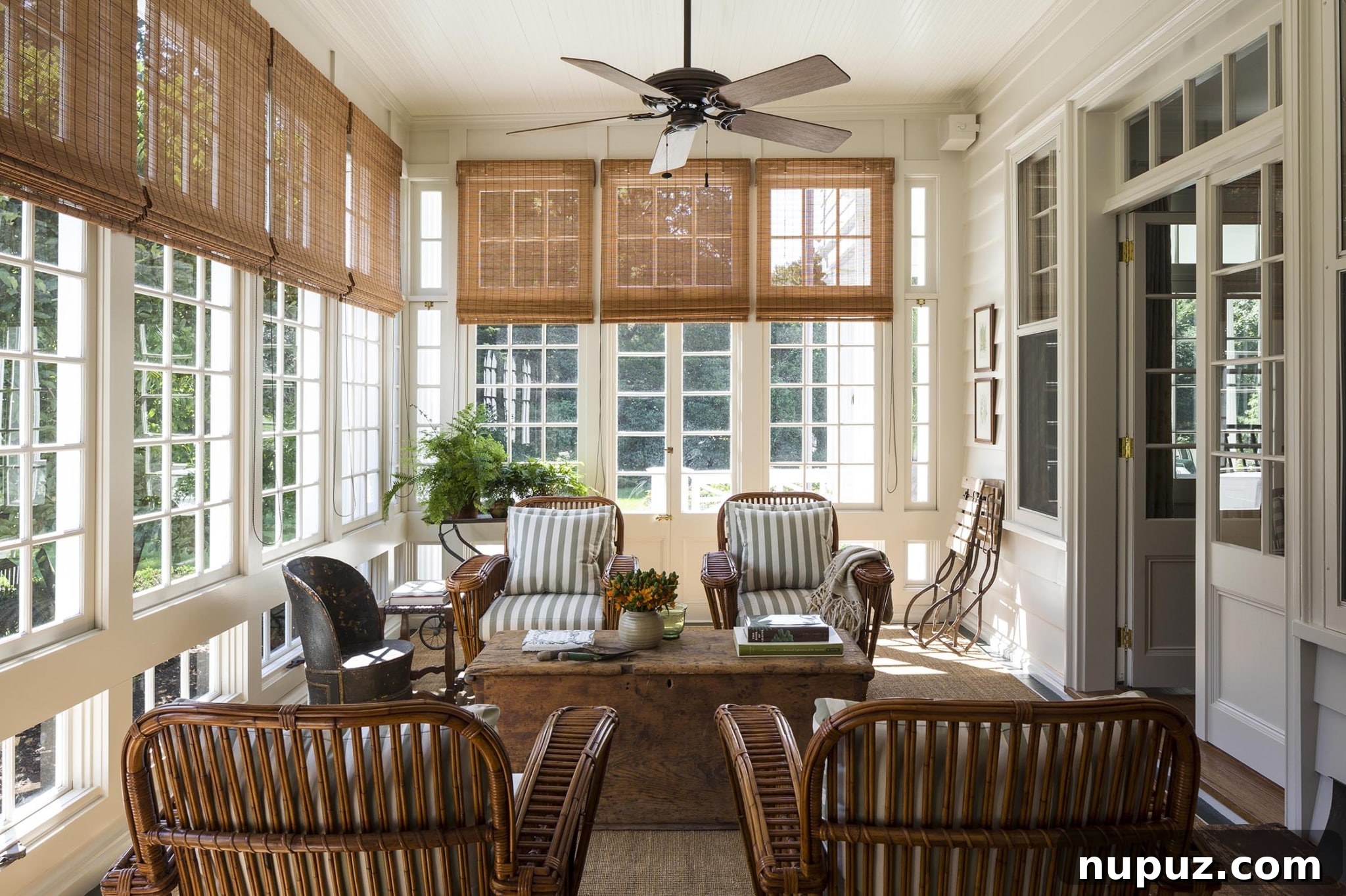 New Canaan's White Clapboard Gem Timeless Style Unveiled 2 Elegant living room interior with classic design and antique furniture in a Mark Cunningham designed home in New Canaan, Connecticut.