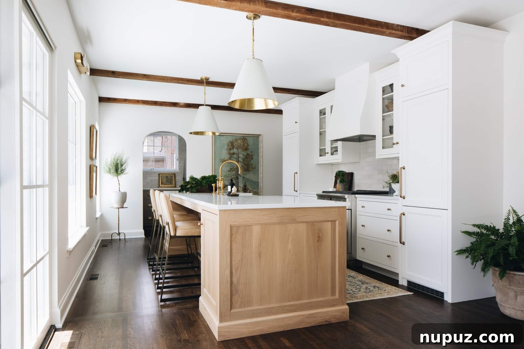 Jean Stoffer's Top 10 Kitchen Masterpieces 2 Exquisite kitchen design by Jean Stoffer featuring custom cabinetry and sophisticated lighting