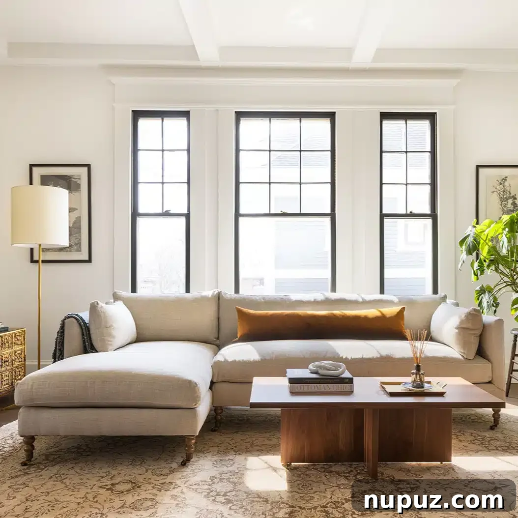 Flawless Fusion: 10 Living Rooms Where Style Meets Function 2 Stoffer Home's signature attention to detail creates comfortable and stylish living rooms, captured by Stoffer Photography Home.