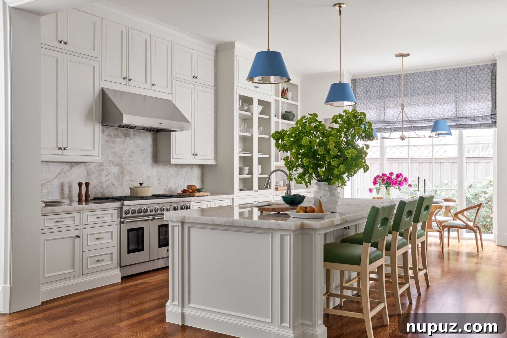 House Tour: Inside Mary Beth Wagner's Elegantly Designed Spaces 3 An elegant dining area in a Dallas residence showcasing custom furnishings, sophisticated lighting, and a blend of contemporary and traditional design elements, photographed by Nathan Schroder.