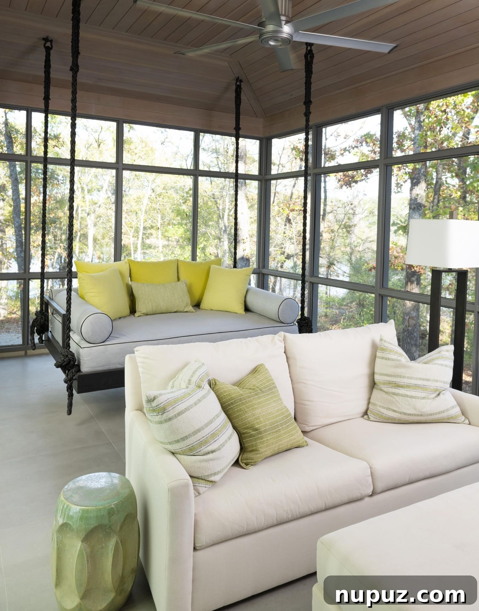 East Texas Glass House: A Modern Architectural Marvel 11 Another interior perspective of the glass house, possibly a bedroom or a cozy nook, highlighting the serene atmosphere and the continuous visual connection to the outdoors.