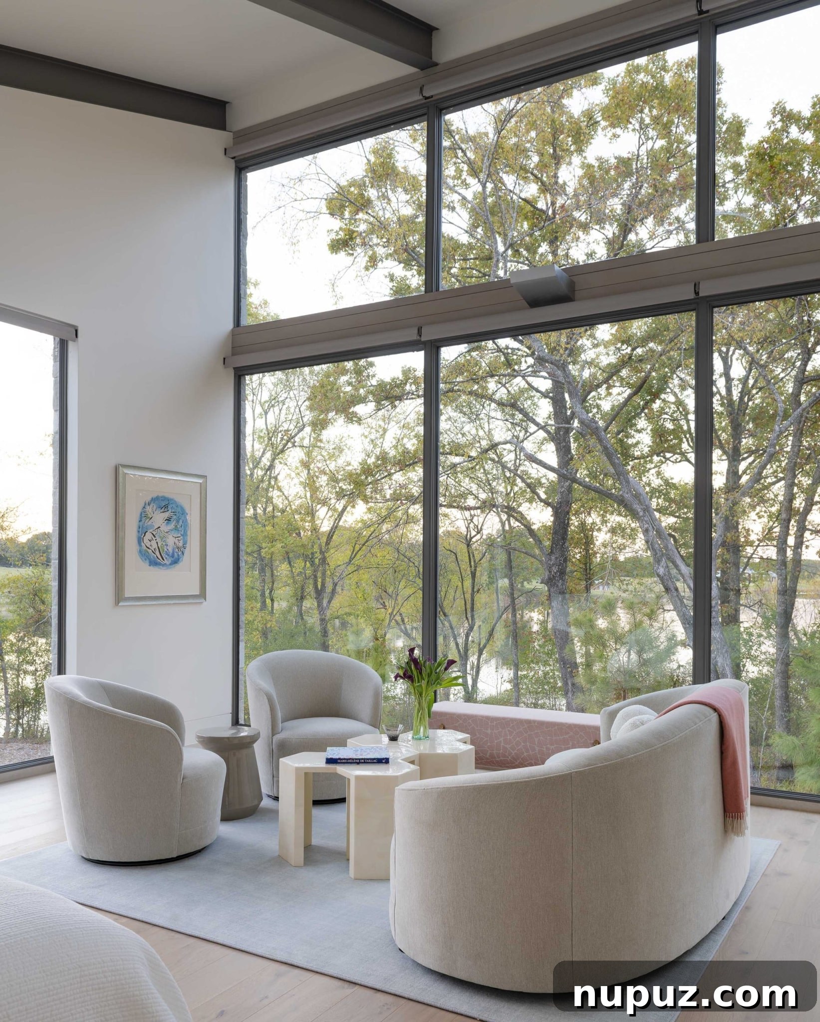 East Texas Glass House: A Modern Architectural Marvel 4 Interior view of the glass house living area, showing comfortable seating, minimalist decor, and expansive views through large windows into the surrounding forest.