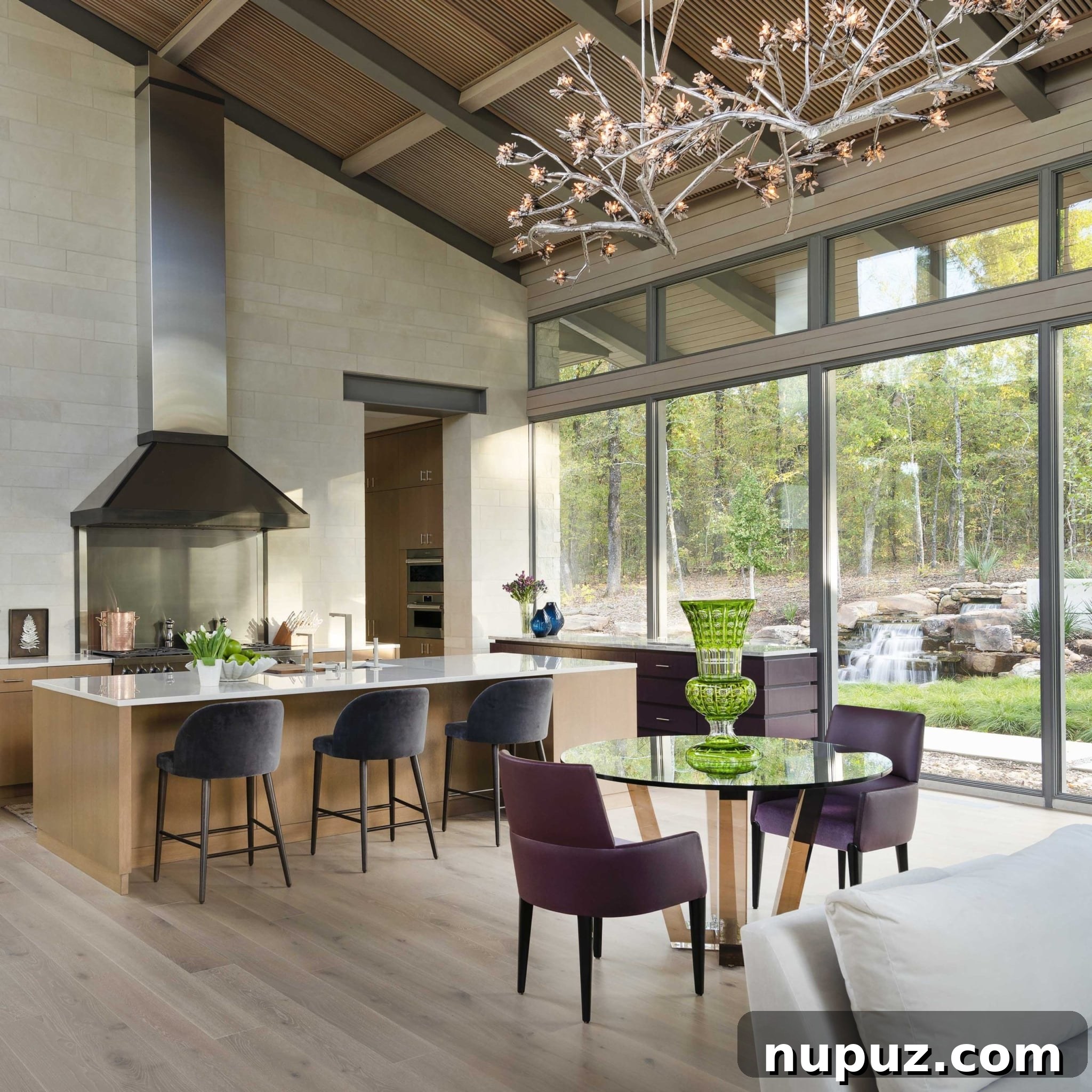 East Texas Glass House: A Modern Architectural Marvel 6 Spacious open-plan living area with modern fireplace, elegant furniture, and expansive glass walls offering uninterrupted views of the natural landscape.