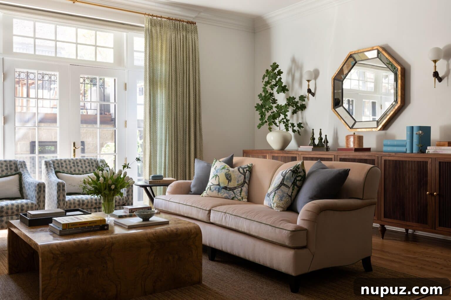 An inspiring view of an Alexandra Kaehler designed dining area, showcasing a blend of modern and traditional elements, exquisite textiles, and a well-curated arrangement.
