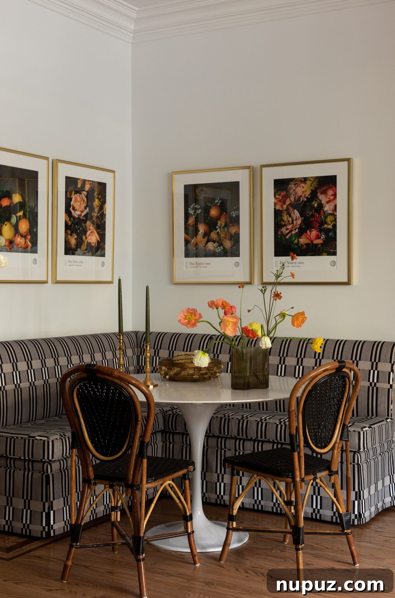 A stunning interior space by Alexandra Kaehler, featuring bold artwork, a unique furniture piece, and an inviting atmosphere that highlights her distinctive approach to design.