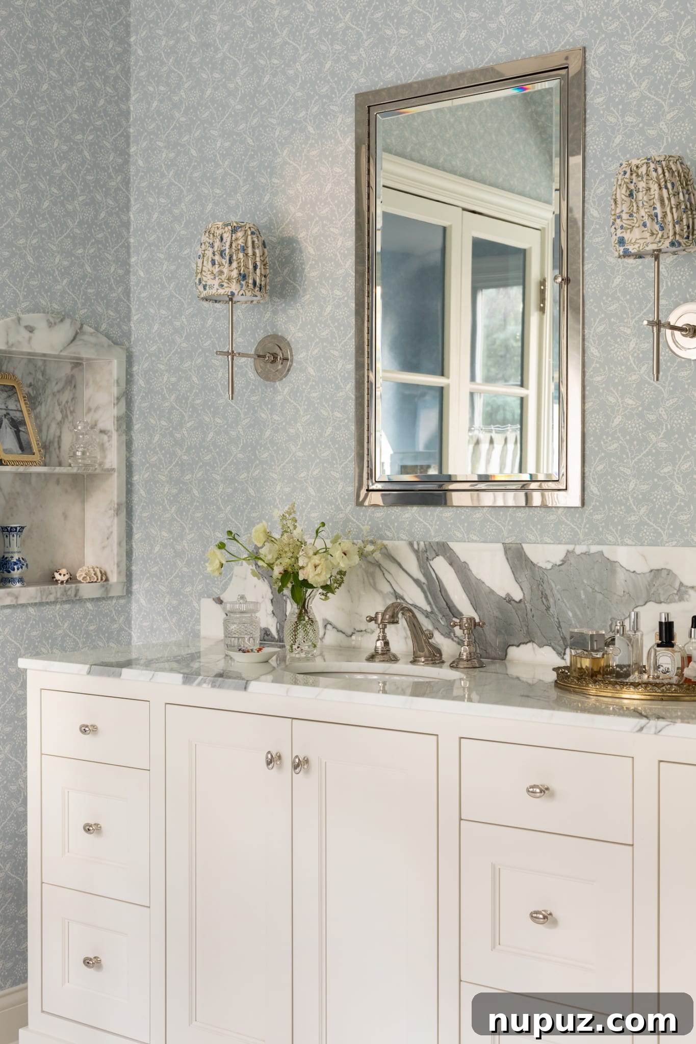 Alexandra Kaehler's expertly designed bedroom, featuring a delicate yet powerful balance of color, luxurious texture, and elegant furnishings, all orchestrated for ultimate comfort and visual appeal.